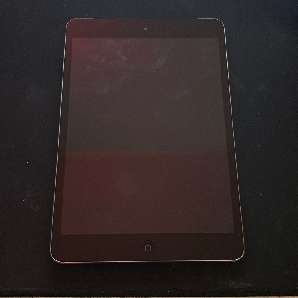 COPY - This is a iPad mini two, there is no cracks or damage to the screen what…